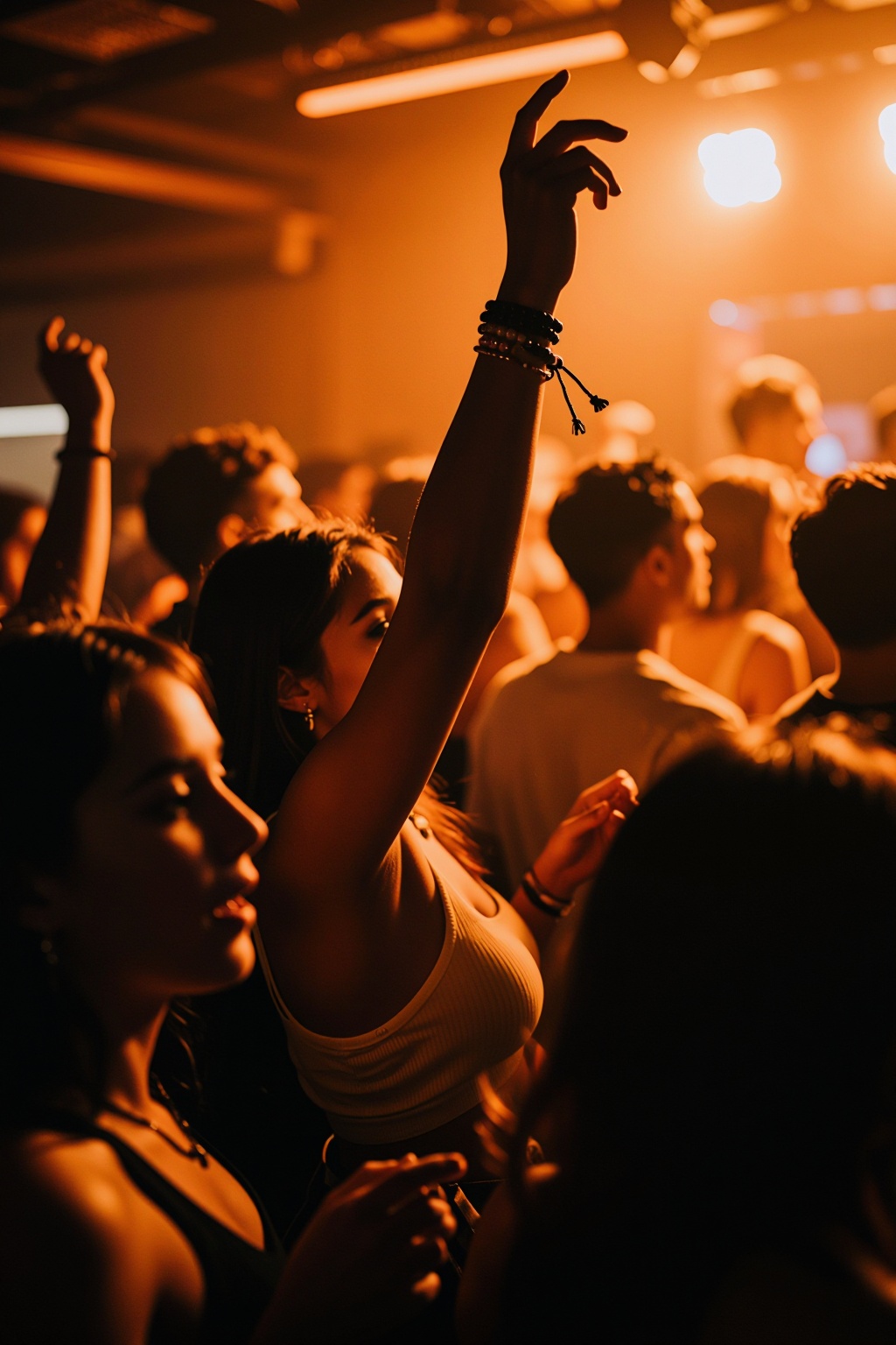 A captivating and atmospheric image captures a lively party scene,  where a crowd is immersed in the moment,  with a focus...