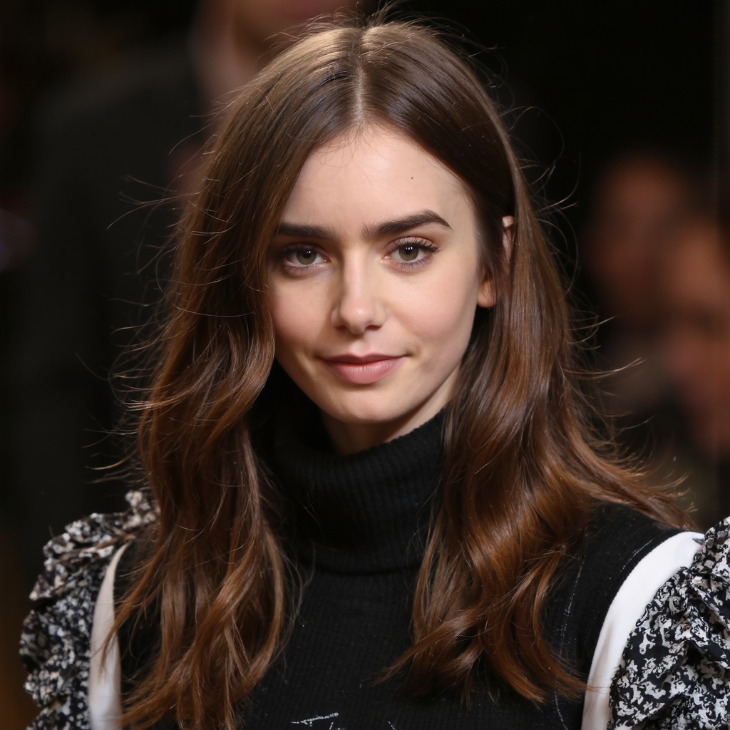 A close-up portrait of lily_collins with long,  wavy brown hair. She wears a black turtleneck sweater with white stripes a...