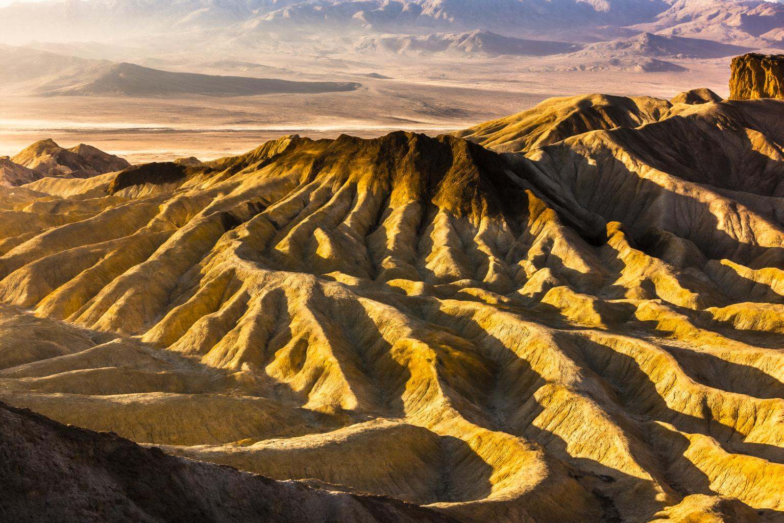 aurelmanea2q photography. A desolate and intensely textural landscape view of Zabriskie Point in Death Valley,  California...