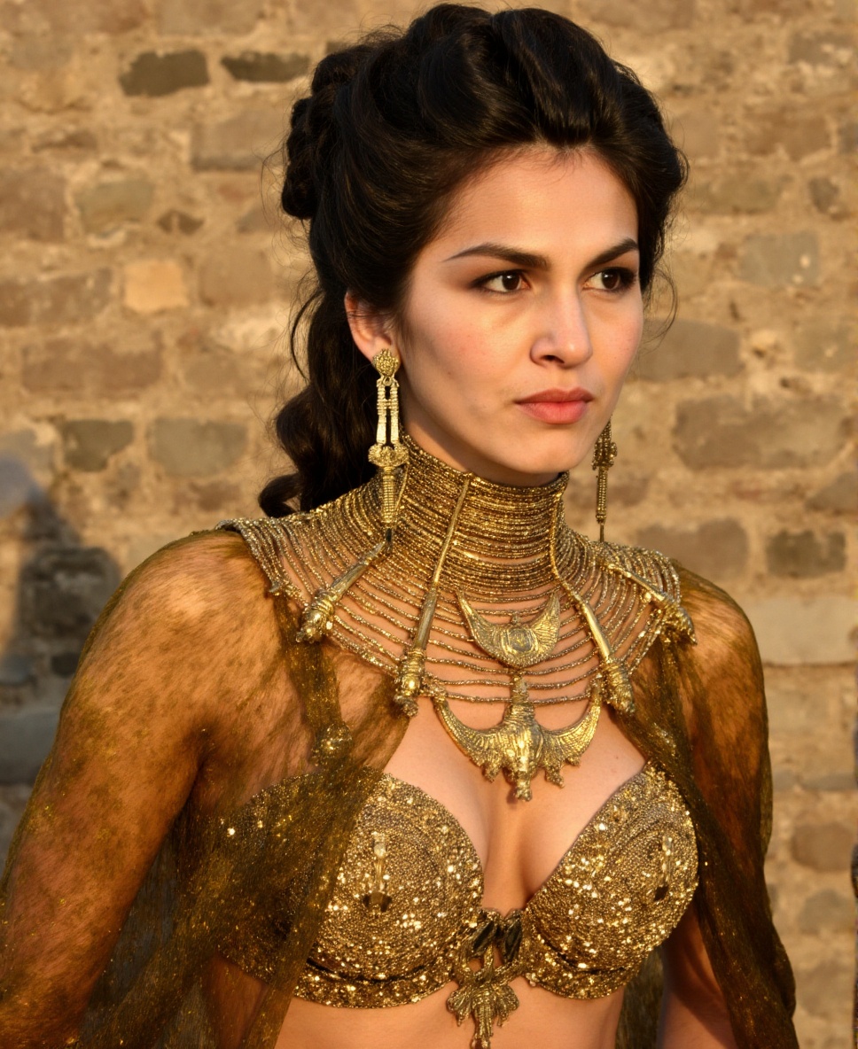 This is a high-resolution photograph of a woman of Middle Eastern or Mediterranean descent,  likely in her mid-20s,  with...