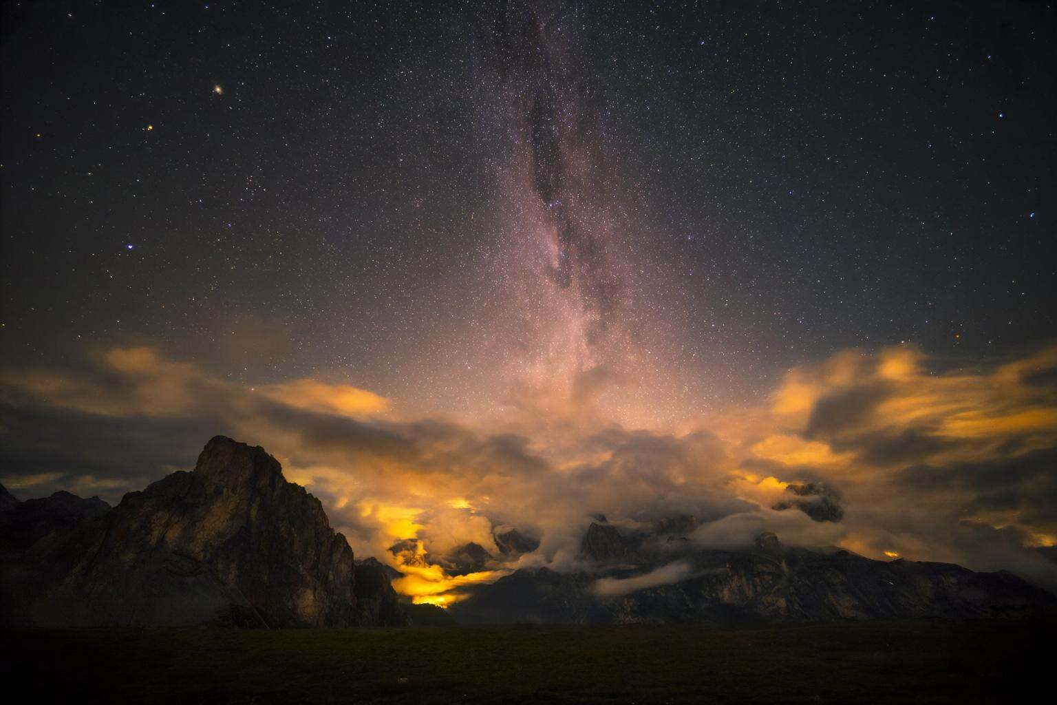 aurelmanea2q photography. aurelmanea2q photography.A nighttime landscape with a prominent view of the Milky Way stretching...