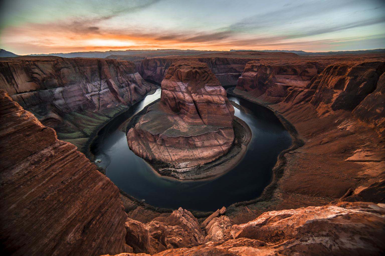 aurelmanea2q photography. A view of the Colorado River winding through the Grand Canyon,  a natural wonder known for its i...