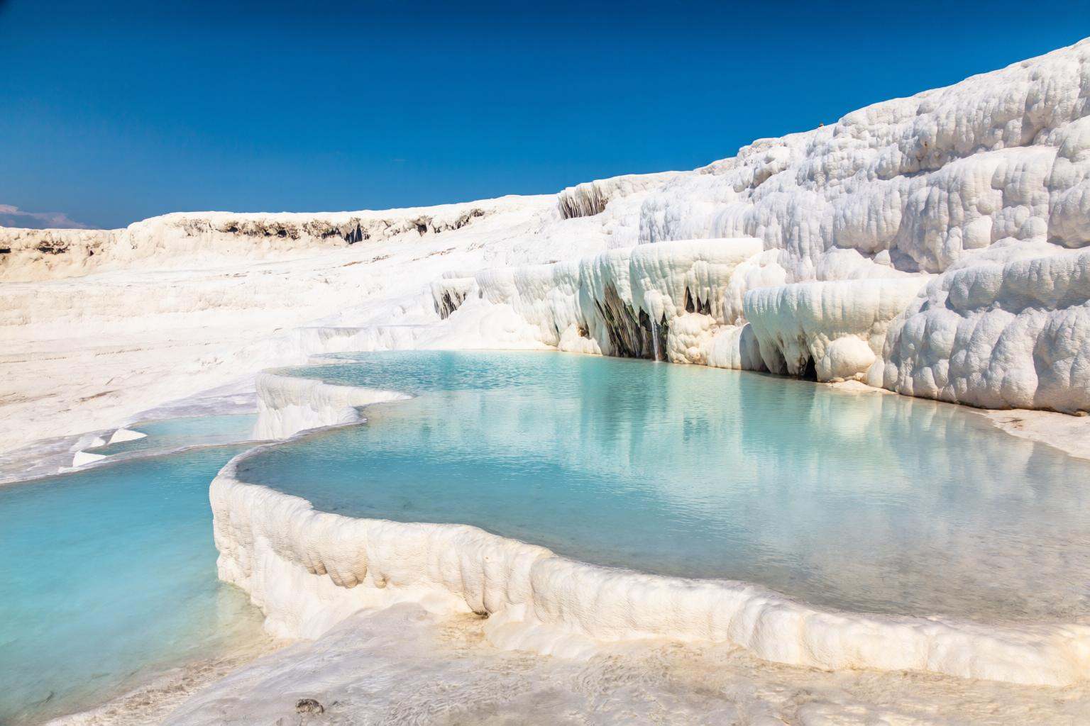 aurelmanea2q photography. A bright and striking landscape view of the Pamukkale white travertines in Turkey. The scene fea...