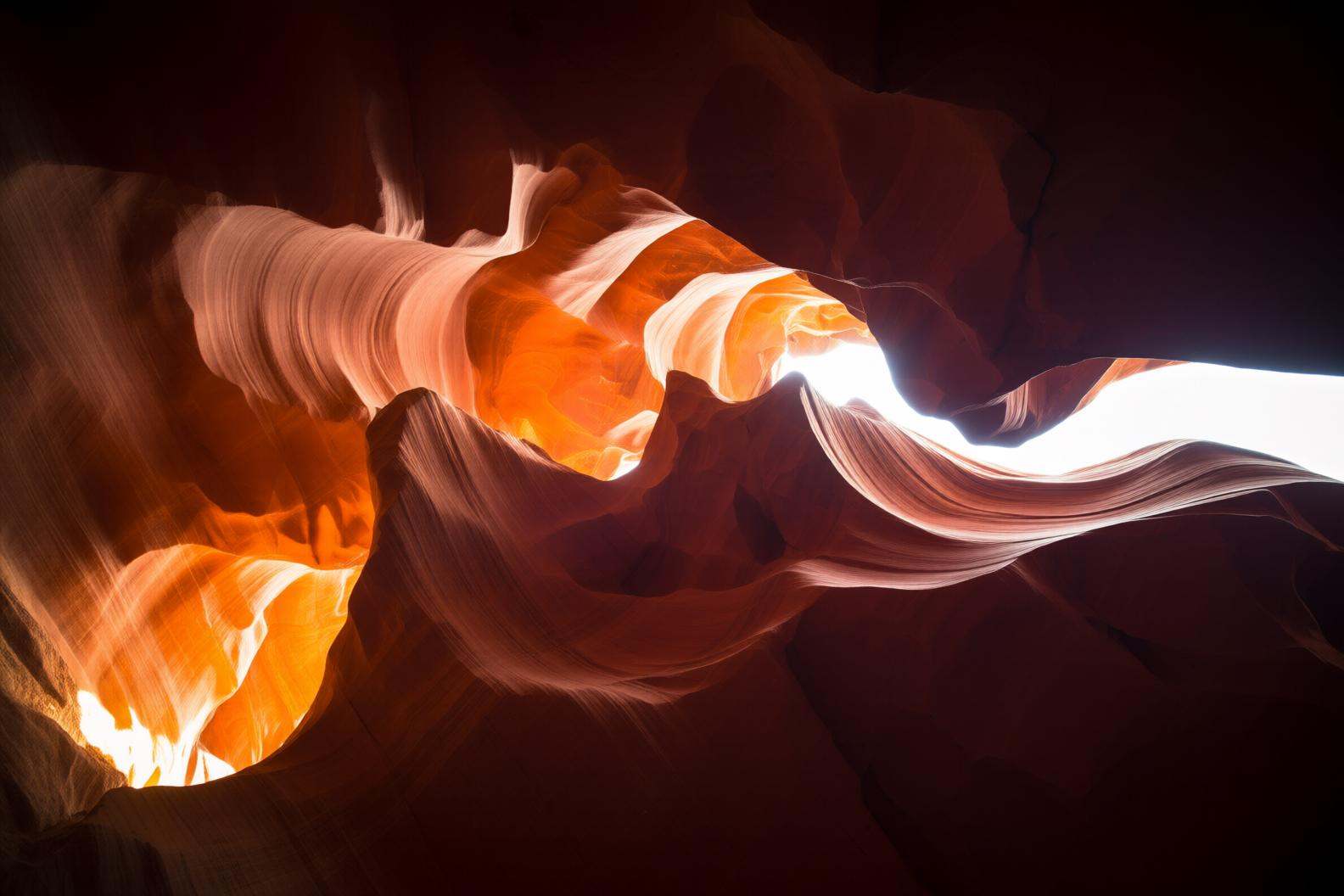 aurelmanea2q photography. A stunning natural landscape,  specifically a slot canyon. The foreground is dominated by smooth...