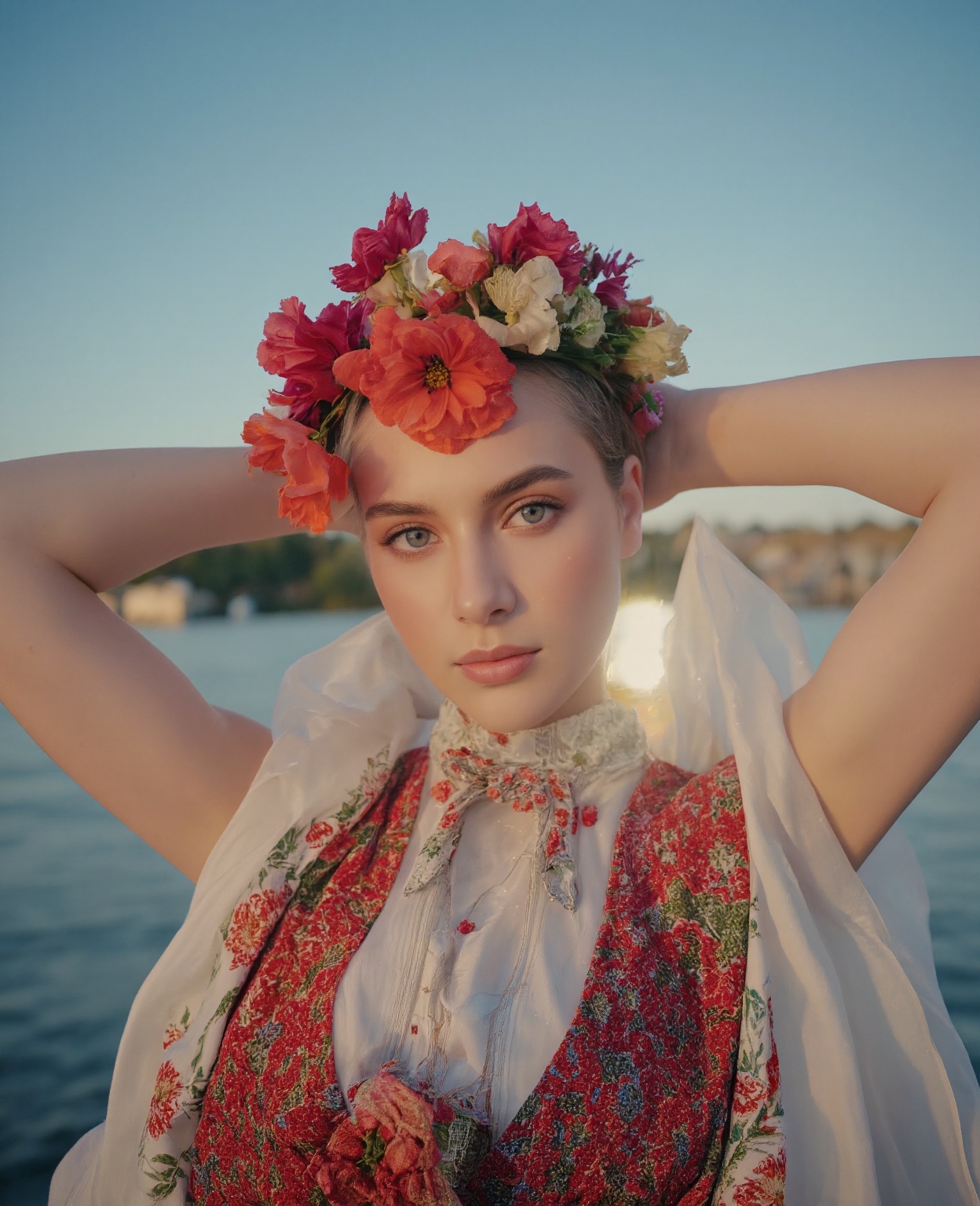 20 year old woman in Ukrainian costume Corolla wreath wearing wreath on head Blue eyes River and blue sky in background Af...