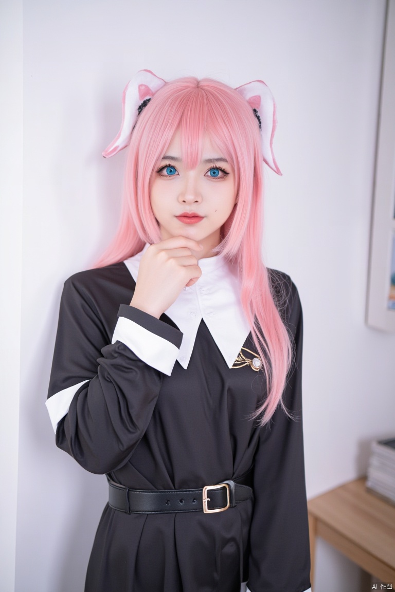 a womanl dressed in a black and white costume, adorned with a white collar and a black belt. Her hair is a vibrant shade of pink, adding a pop of color to the scene. Her eyes are a piercing blue, and her lips are a bright pink. Her eyebrows are a darker shade of black, adding depth to the composition. She is wearing a pair of pointed ears, a matching pink tail, and a matching black shirt with white trim. The shirt has a black collar with white buttons and a white belt. The woman's left hand is resting on her chin, while her right hand rests on her left hand. She stands in front of a white wall, with a bookshelf on the right side of the frame.