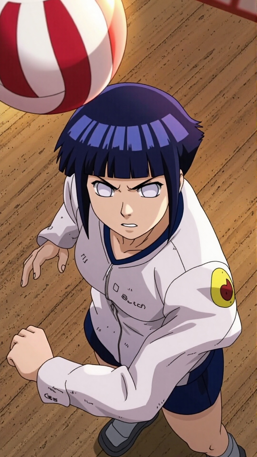 A close-up shot captures Hinata Hyūga's determined expression as she gazes intensely at a volleyball flying towards her. S...