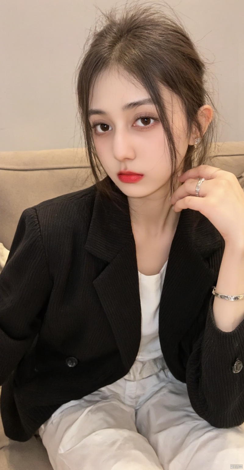 drbb,(a woman with blonde hair,black blazer,white button-down shirt,silver bracelet,seated on a beige couch,left hand resting on the armrest,right hand on the pillow,silver ring,beautiful detailed eyes,beautiful detailed lips,extremely detailed eyes and face,long eyelashes,beige couch,white wall,best quality,4k,8k,highres,masterpiece:1.2,ultra-detailed,realistic,photorealistic,photo-realistic:1.37,studio lighting,sharp focus,physically-based rendering,extreme detail description,professional,vivid colors,bokeh,portrait,modern style,elegant,fashionable,soft lighting,calm atmosphere)