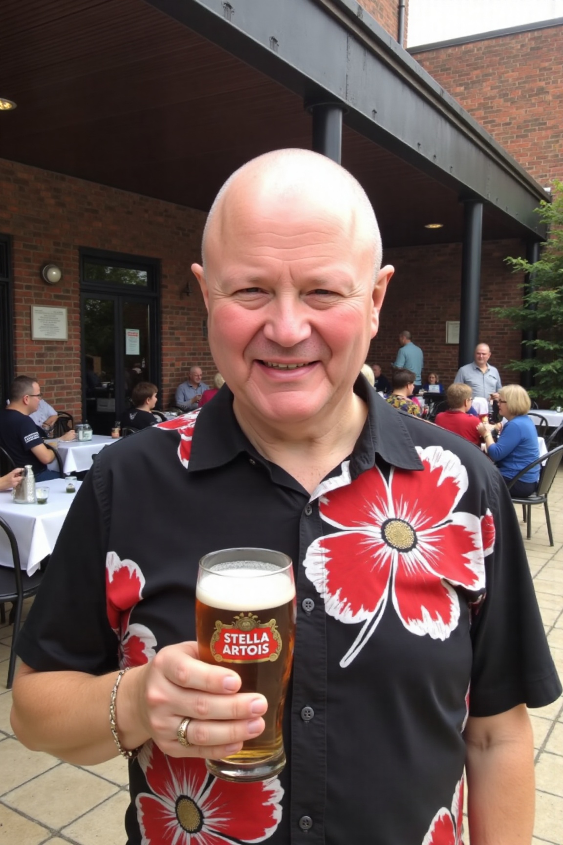 The image is a high-resolution photograph of George Noble,  a smiling middle-aged man standing outdoors in a casual settin...