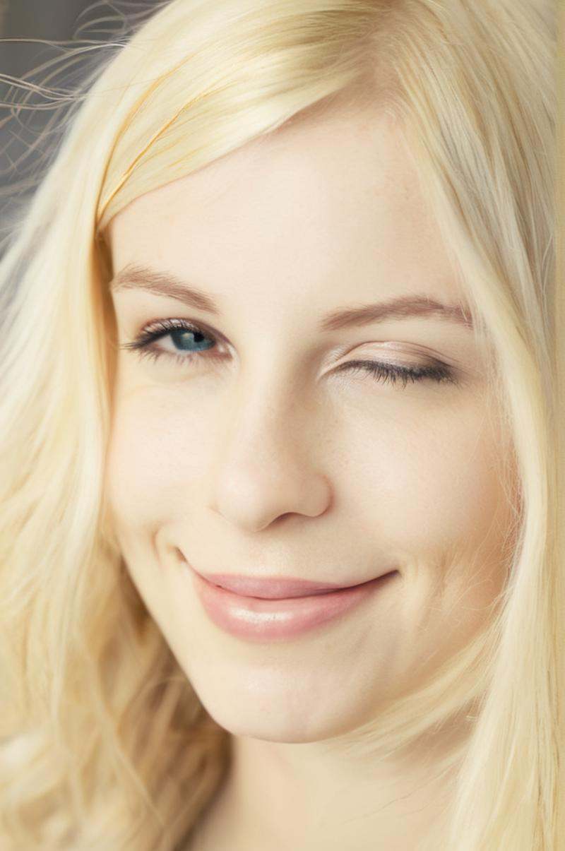 photo of a 20yo woman with blond hair \(winks with one eye at viewer\) on Tensor.Art