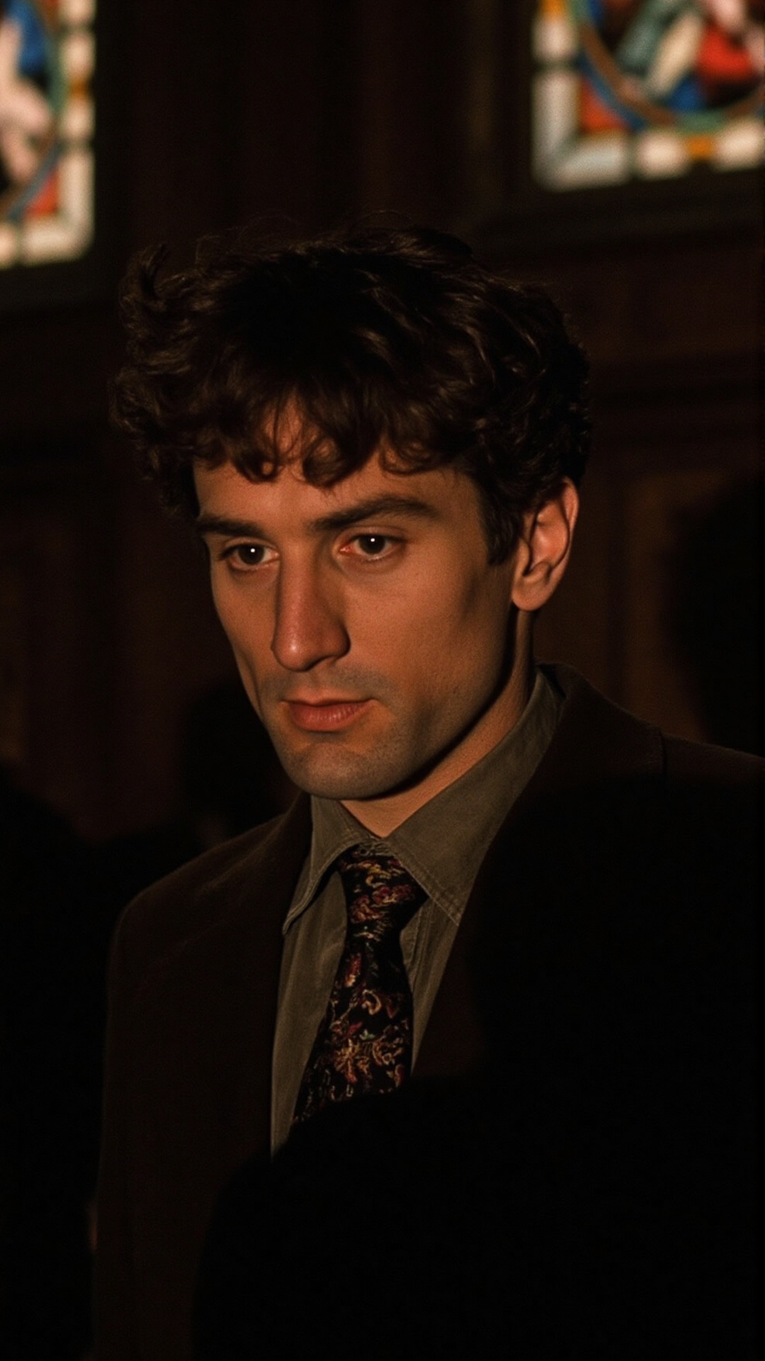 A close-up shot of a man in his late 30s,  with a somber,  intense expression on Tensor.Art