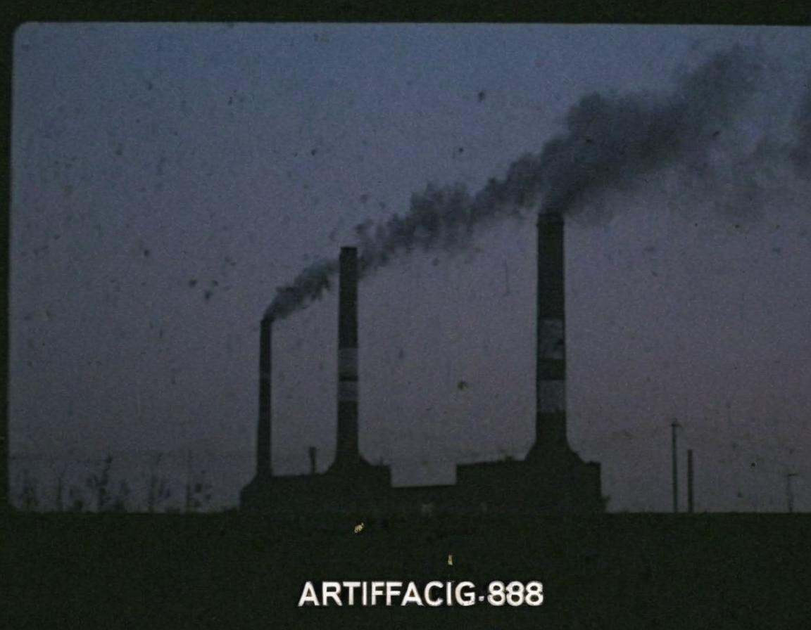 vhscore808,  A distorted,  VHS-style snapshot of industrial smokestacks piercing the twilight sky on Tensor.Art