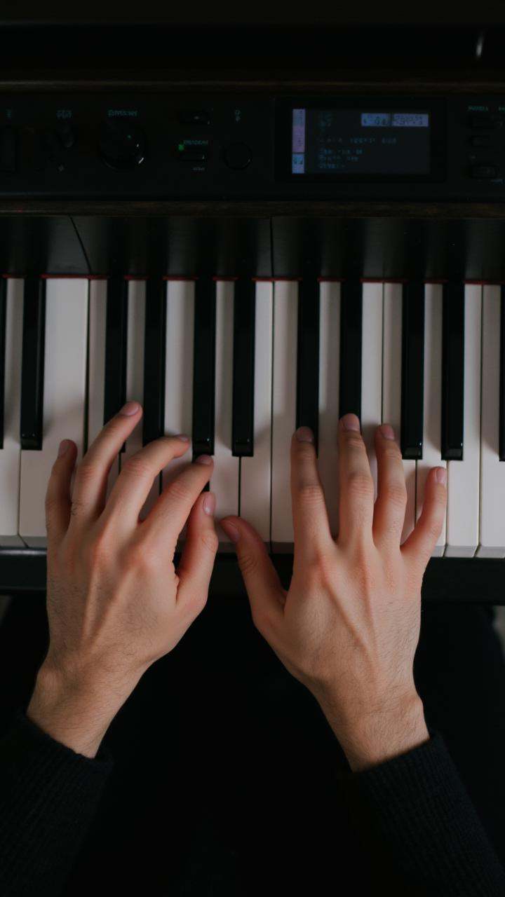 2 hands,  playing a piano,  keys moving swiftly on Tensor.Art