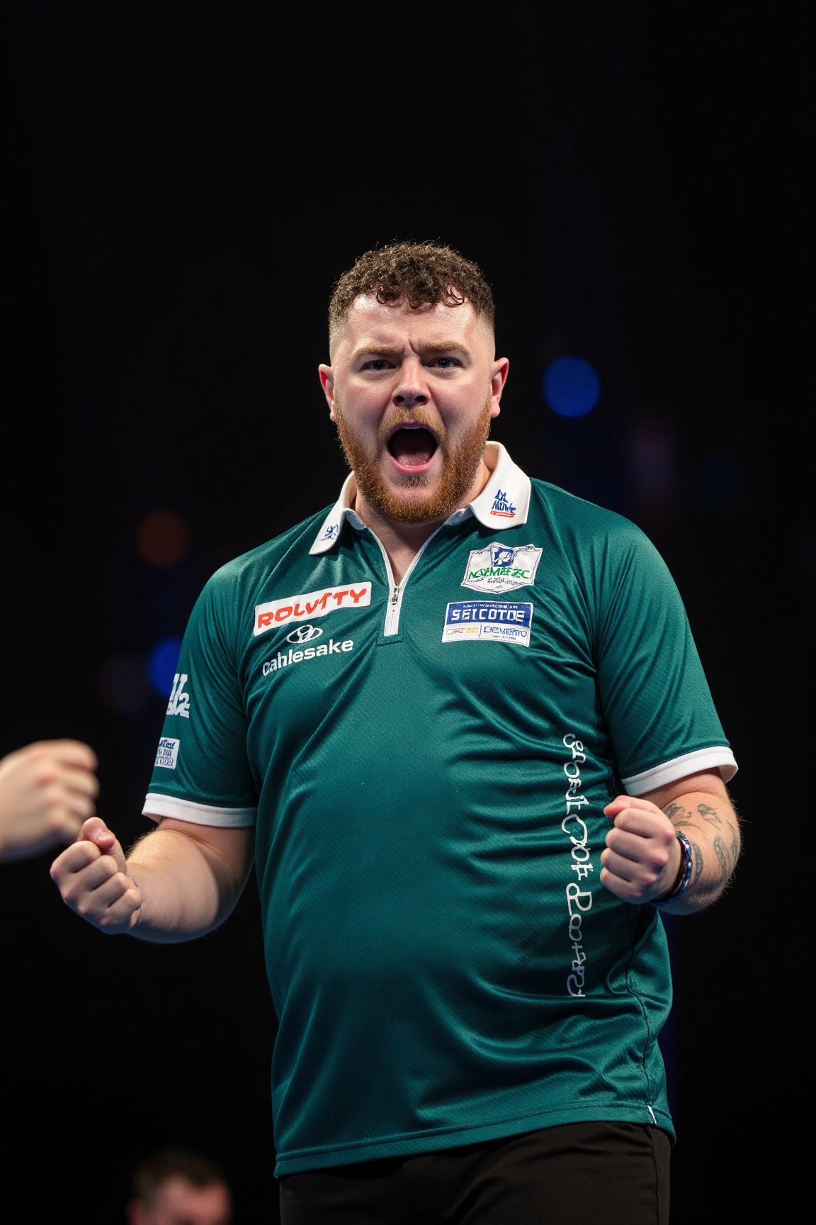 photo of jxr,  The image shows a person wearing a green sports jersey with various logos and text on it. The jersey featur...