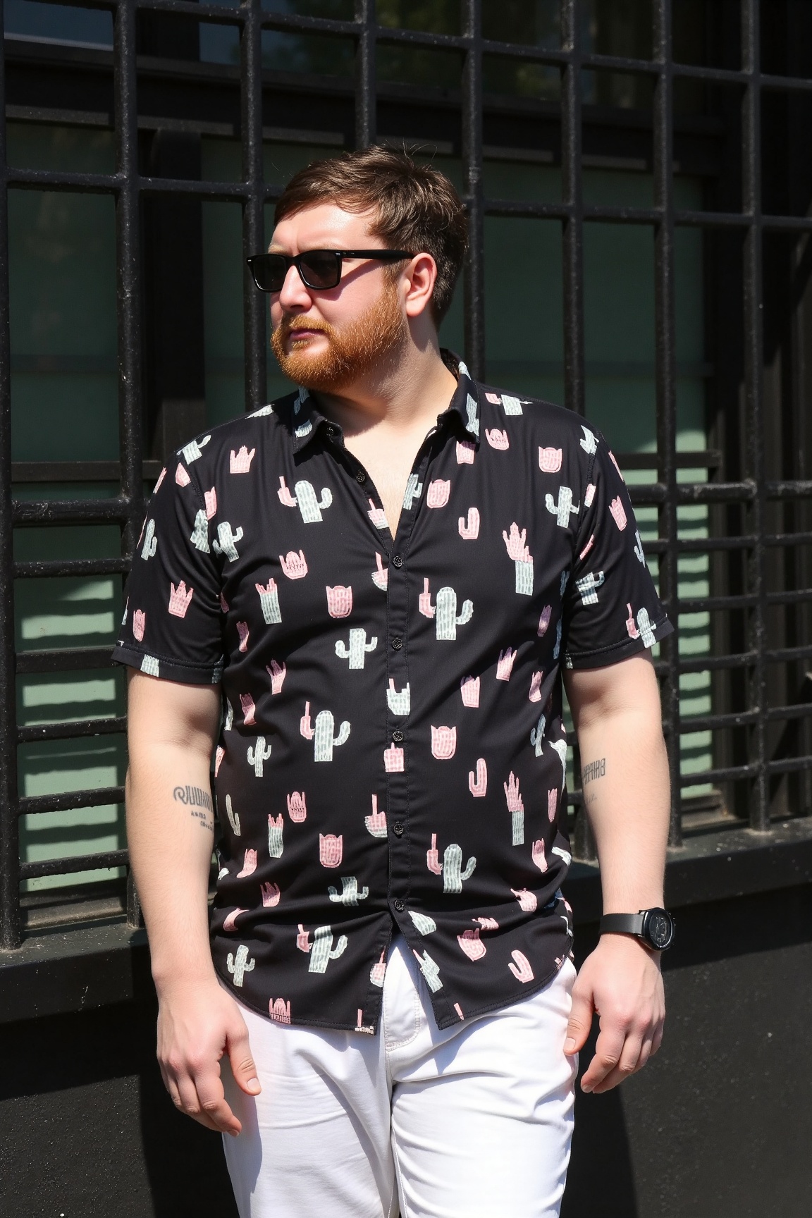 A high-resolution photograph of a man standing outdoors,  in front of a shopfront. The man has short,  dark brown hair and...