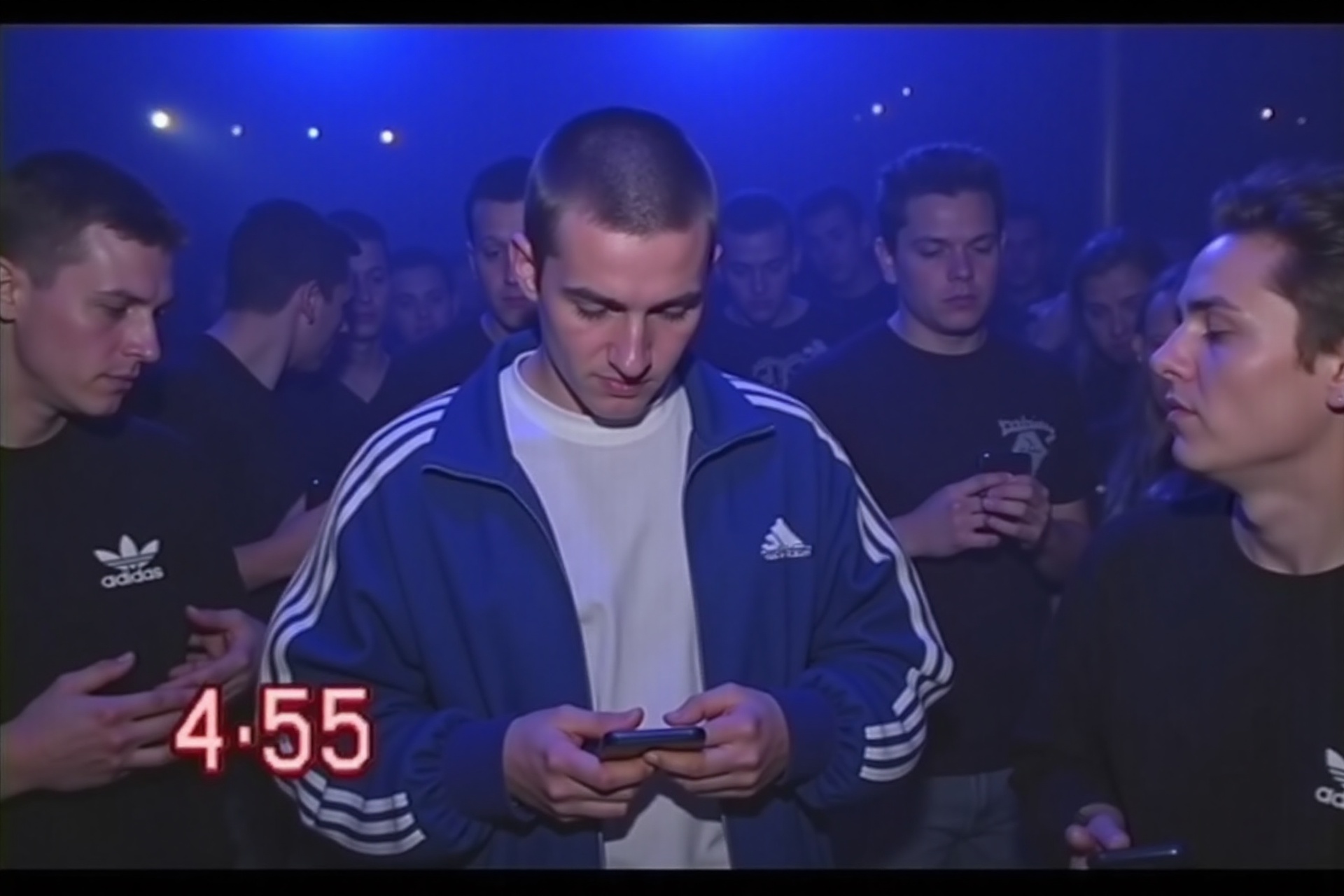 vhsc0re,  a candid scene from a 90s rave captures young people in Adidas sportswear,  the entire camcorder video drenched...