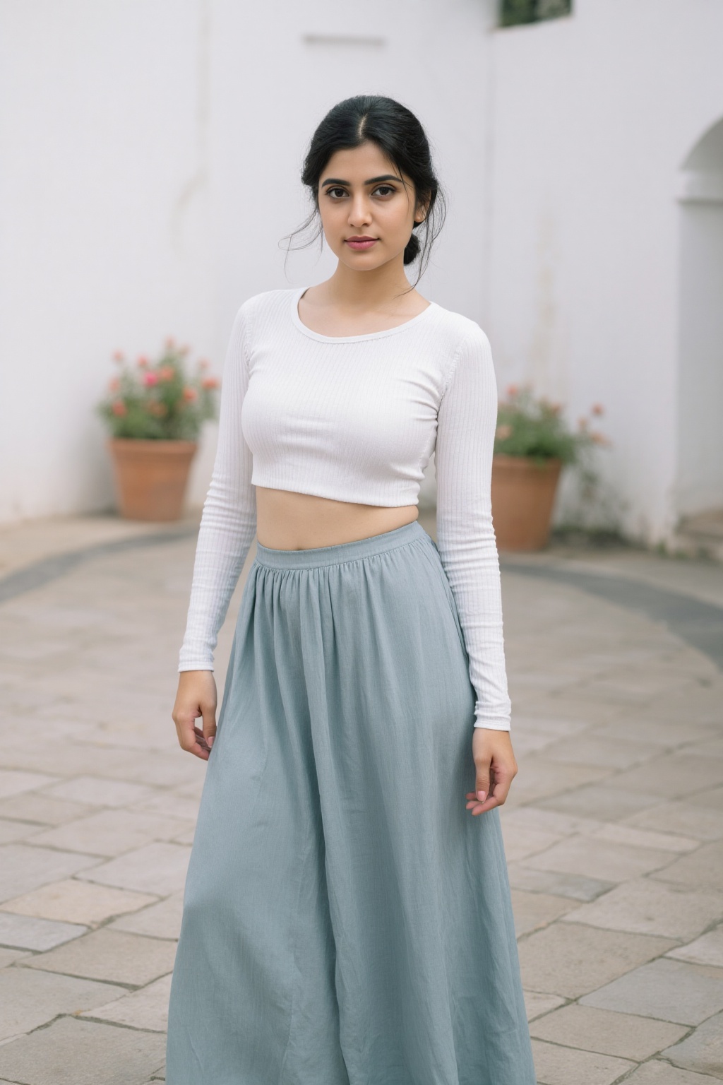 Full-body photorealistic portrait of a beautiful Indian woman standing gracefully in an outdoor courtyard during overcast...