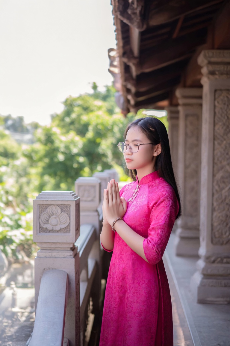 A dramatic,  cinematic portrait of a beautiful girl in a bright pink traditional dress with intricate patterns stands in f...