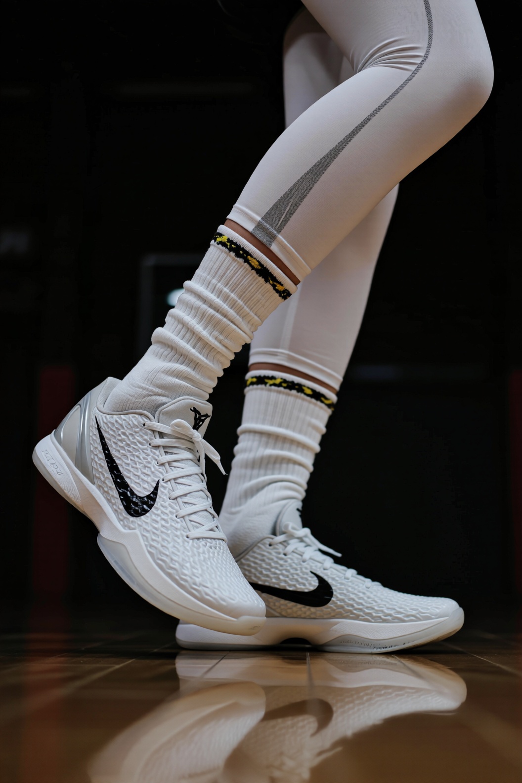 Nike Zoom Kobe 6 White,  男性穿着该鞋款,  搭配带黑黄装饰的白色长袜、白色紧身裤 on Tensor.Art