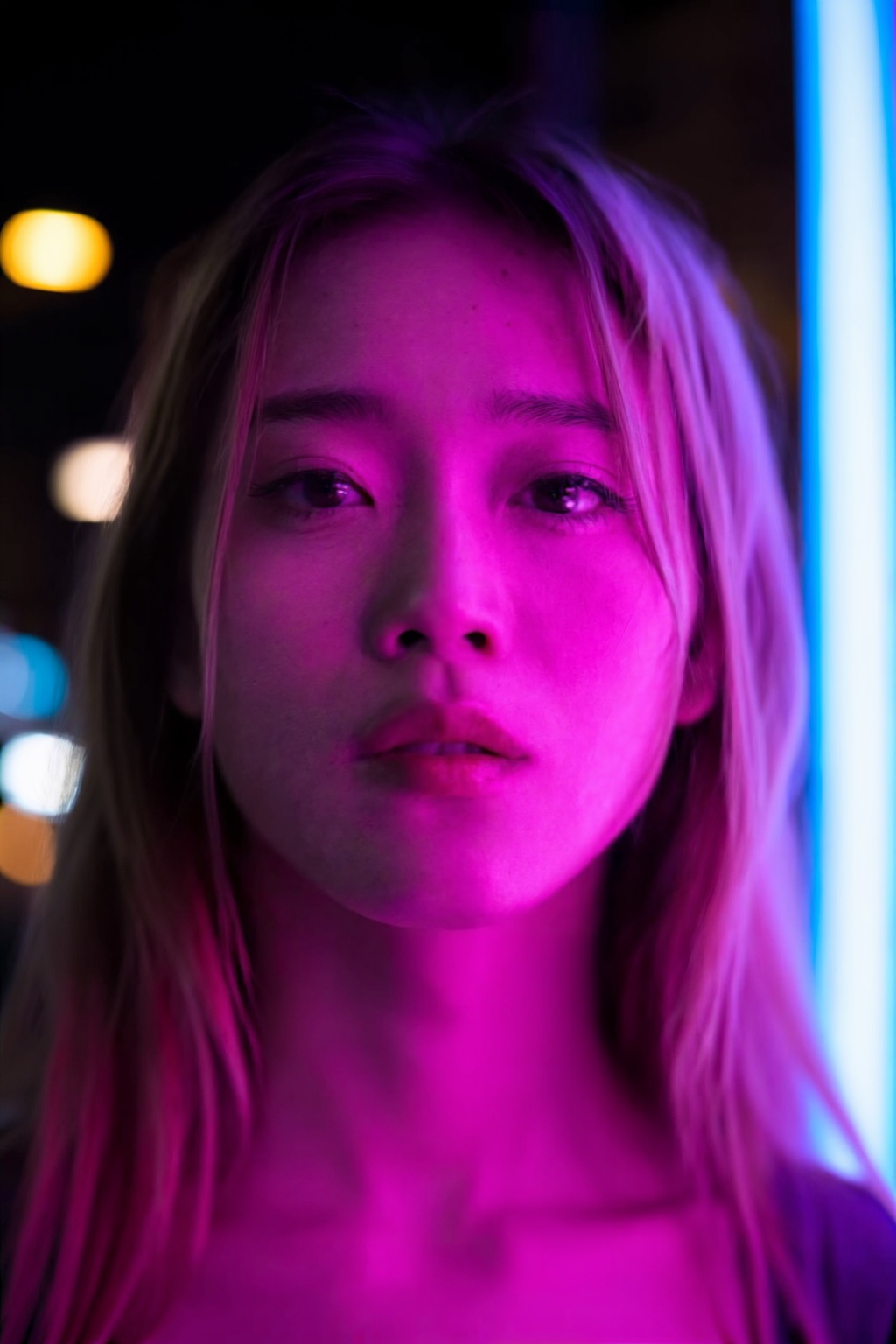A sensual cinematic,  medium-close portrait of an early twenties woman's face,  taken in a low-light environment. She has...
