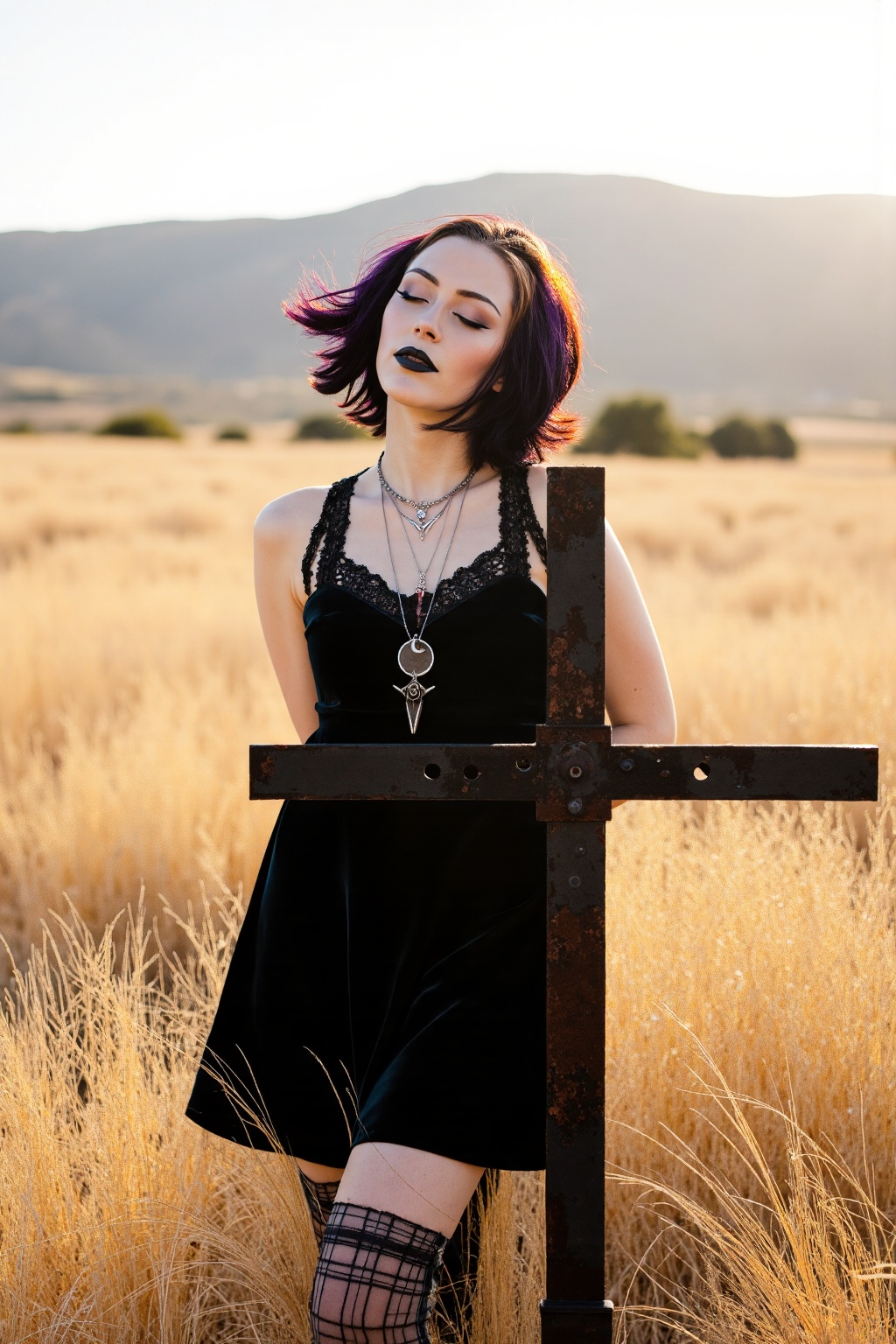 A hyper-realistic outdoor gothic portrait of a young woman standing solemnly behind a weathered iron cross in a barren,  s...