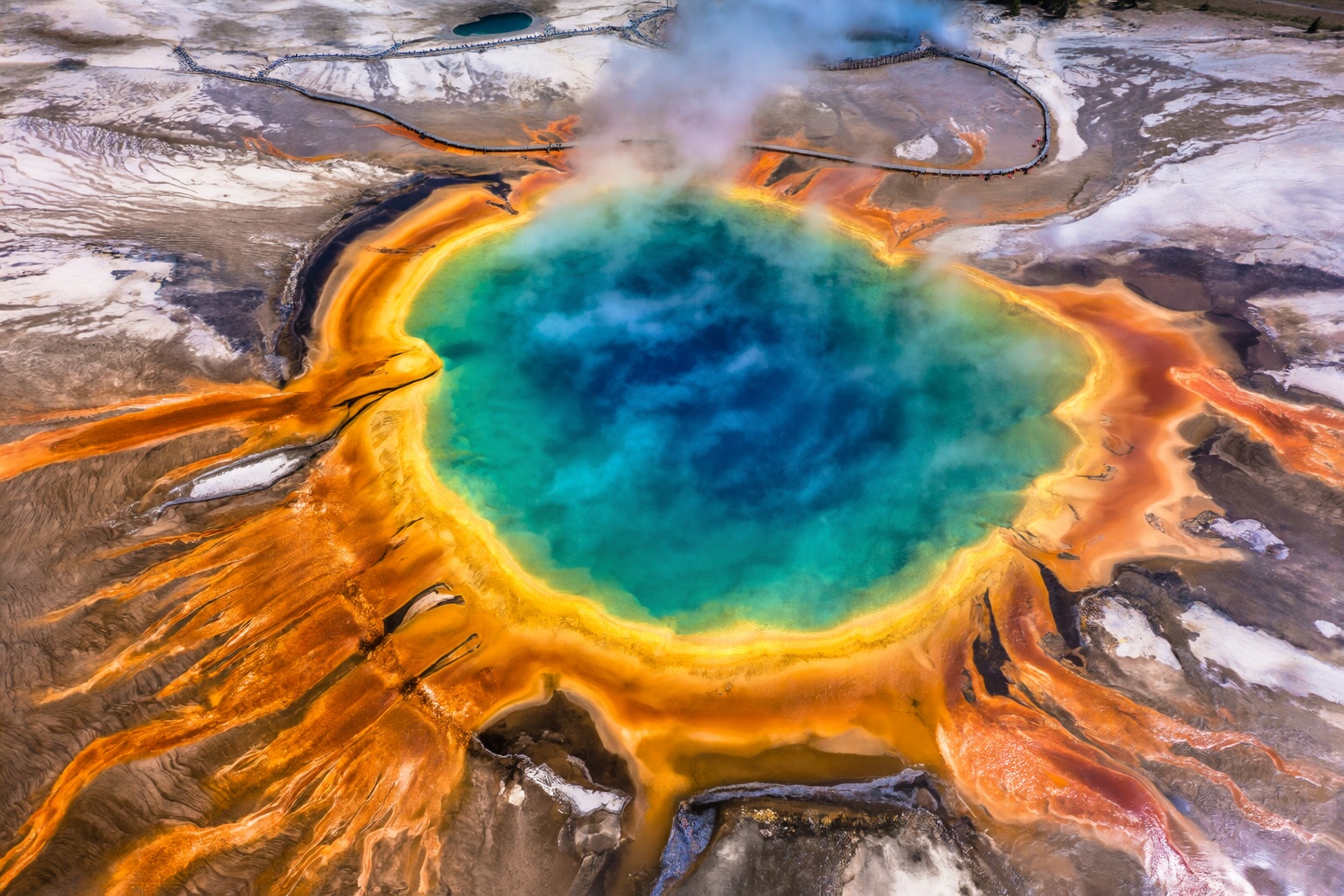 aurelmanea2q photography. An astonishing aerial or slightly elevated wide-angle view of the Grand Prismatic Spring in Yell...