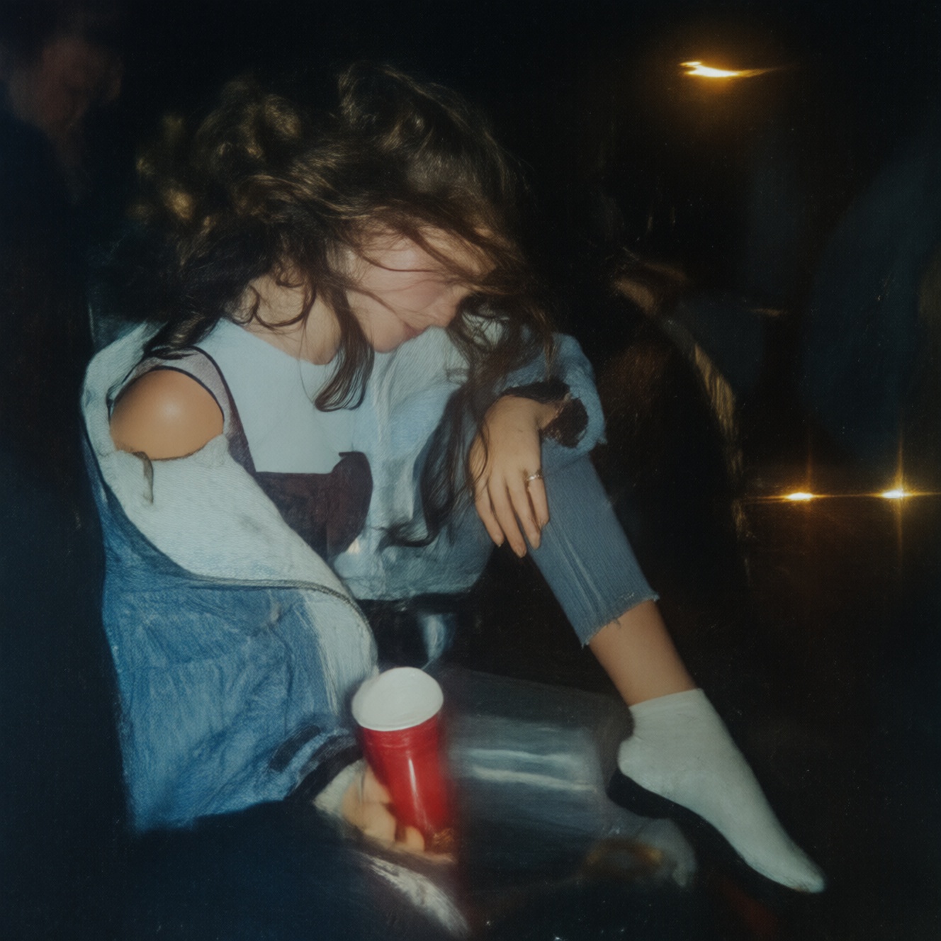 90zVibez,  A nostalgic 90s snapshot of a woman sitting on the hood of a car at night outside a house party,  holding a red...